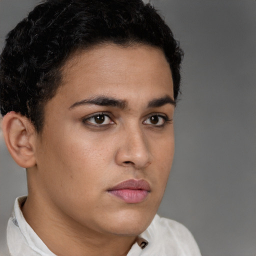 Neutral latino young-adult male with short  brown hair and brown eyes