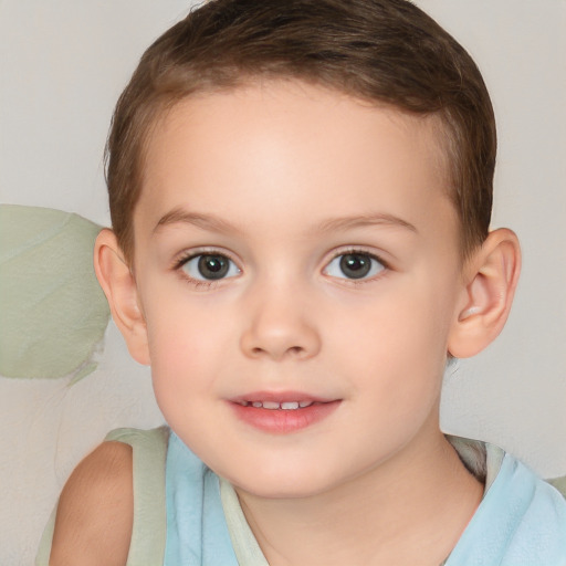 Joyful white child female with short  brown hair and brown eyes