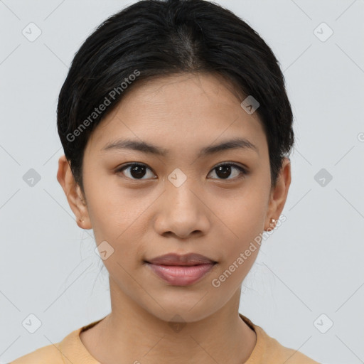 Joyful asian young-adult female with short  black hair and brown eyes