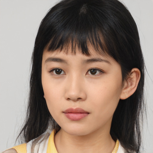 Neutral asian young-adult female with medium  brown hair and brown eyes