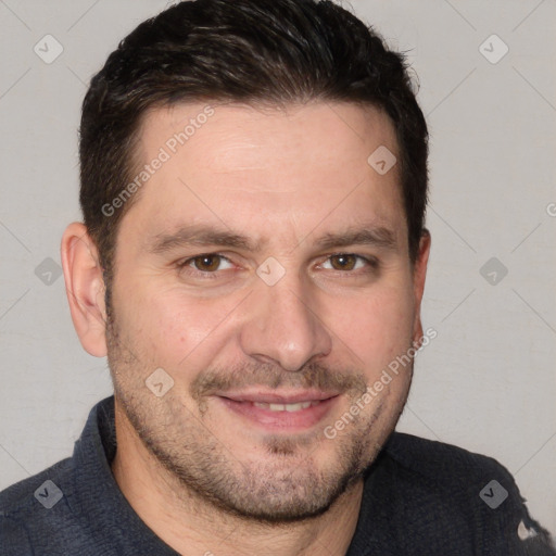 Joyful white adult male with short  brown hair and brown eyes