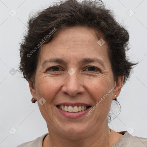 Joyful white adult female with short  brown hair and brown eyes