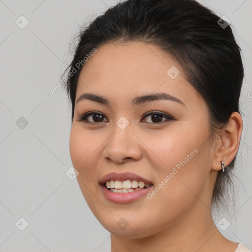 Joyful white young-adult female with medium  brown hair and brown eyes