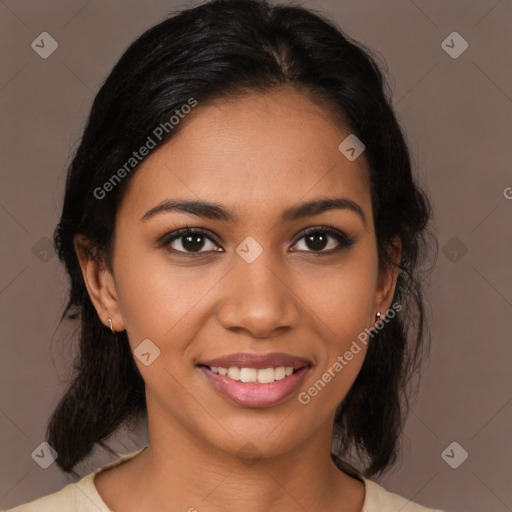 Joyful latino young-adult female with medium  brown hair and brown eyes