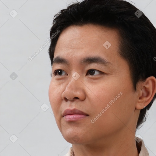 Neutral asian young-adult male with short  black hair and brown eyes