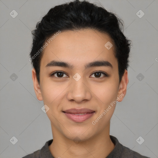 Joyful latino young-adult male with short  black hair and brown eyes