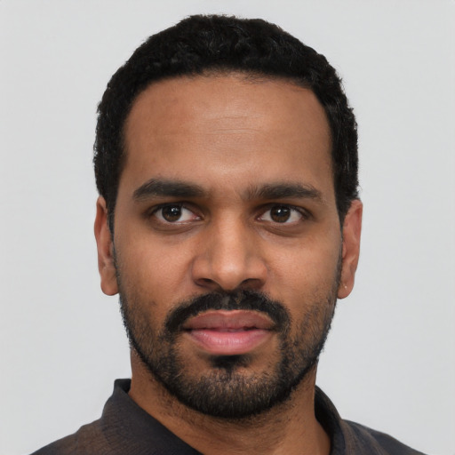 Neutral black young-adult male with short  black hair and brown eyes
