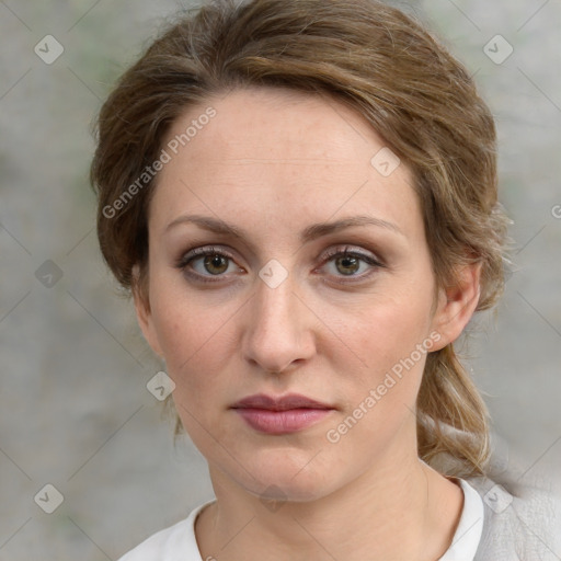 Joyful white young-adult female with medium  brown hair and green eyes