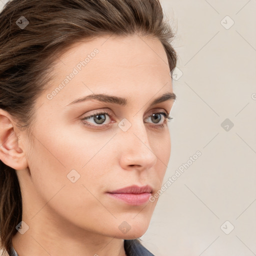 Neutral white young-adult female with long  brown hair and blue eyes