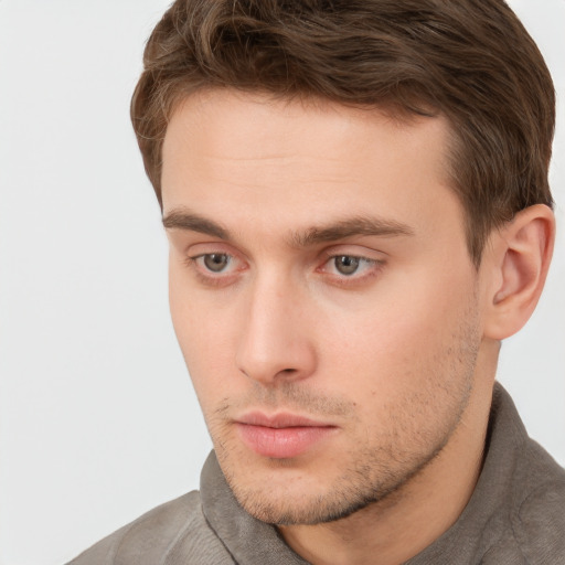 Neutral white young-adult male with short  brown hair and grey eyes