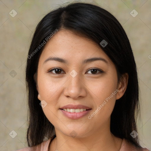 Joyful latino young-adult female with medium  brown hair and brown eyes