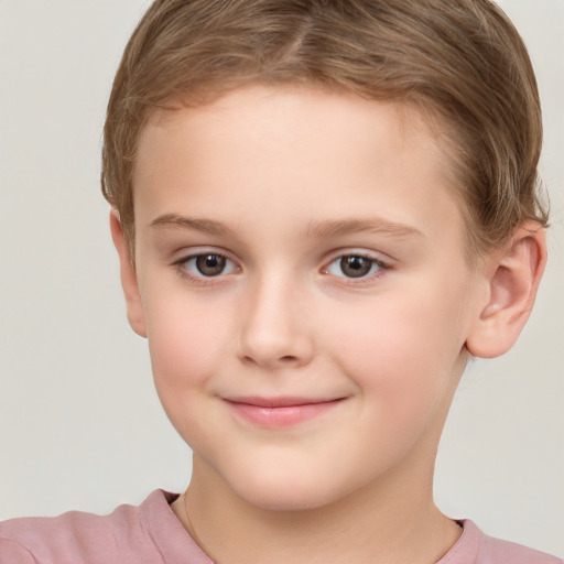 Joyful white child female with short  brown hair and brown eyes