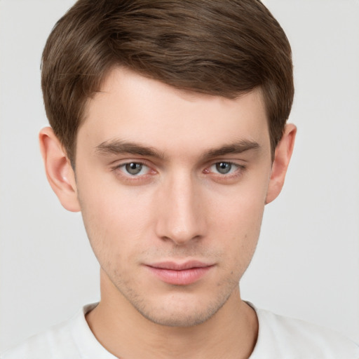 Neutral white young-adult male with short  brown hair and grey eyes