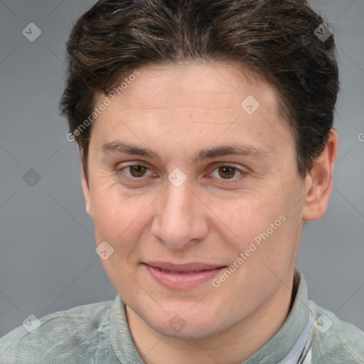 Joyful white adult female with short  brown hair and grey eyes