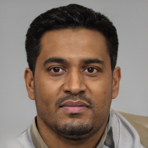 Neutral black young-adult male with short  black hair and brown eyes