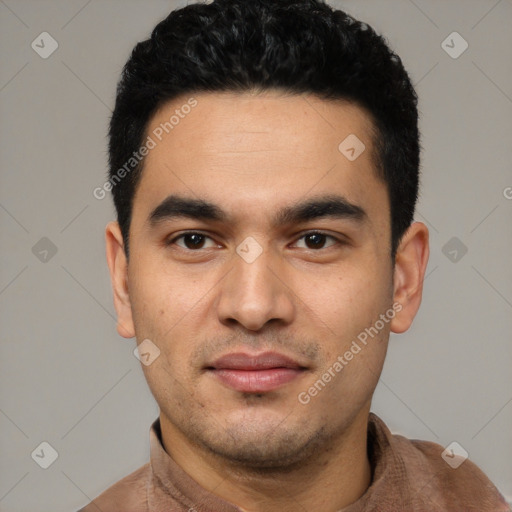 Joyful white young-adult male with short  black hair and brown eyes