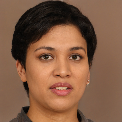 Joyful white young-adult female with short  brown hair and brown eyes
