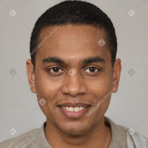 Joyful black young-adult male with short  black hair and brown eyes