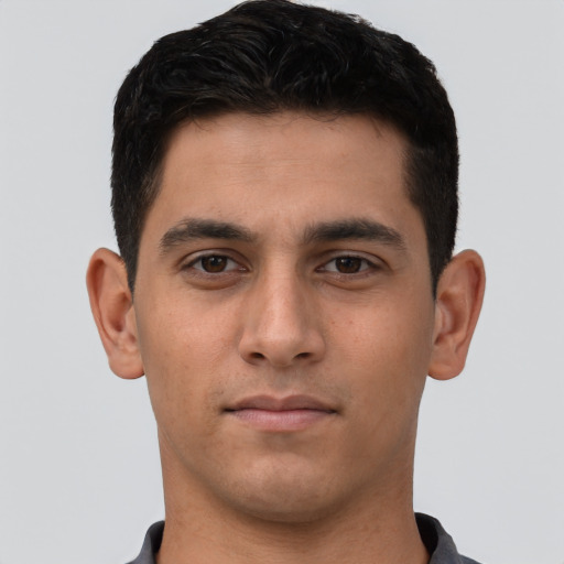 Neutral white young-adult male with short  black hair and brown eyes