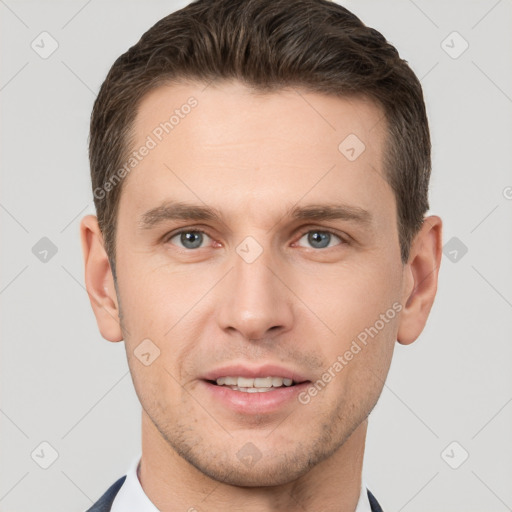 Joyful white young-adult male with short  brown hair and brown eyes