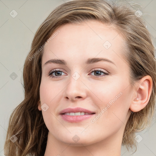 Joyful white young-adult female with medium  brown hair and blue eyes