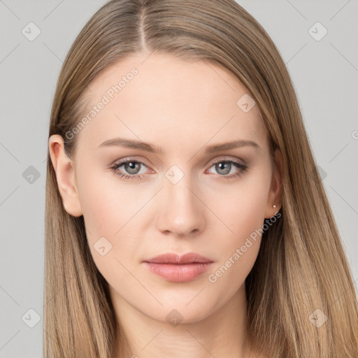 Neutral white young-adult female with long  brown hair and brown eyes