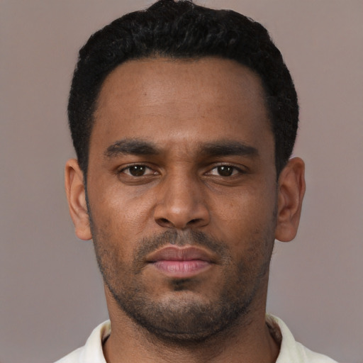 Neutral black young-adult male with short  black hair and brown eyes
