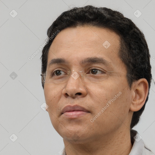 Neutral white adult male with short  black hair and brown eyes