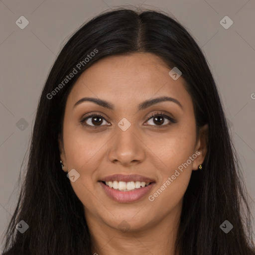 Joyful latino young-adult female with long  brown hair and brown eyes