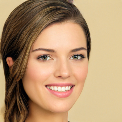 Joyful white young-adult female with long  brown hair and green eyes