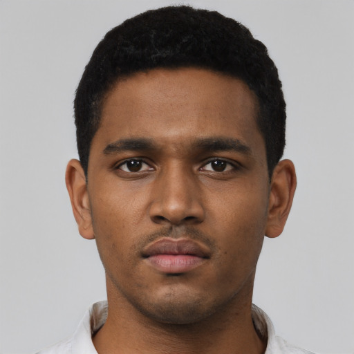 Neutral black young-adult male with short  black hair and brown eyes