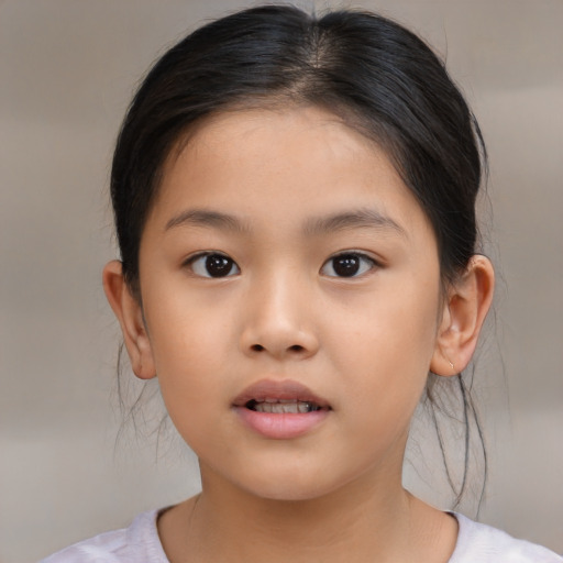 Neutral asian child female with medium  brown hair and brown eyes