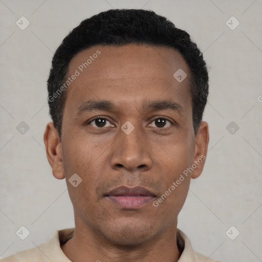 Neutral latino young-adult male with short  black hair and brown eyes