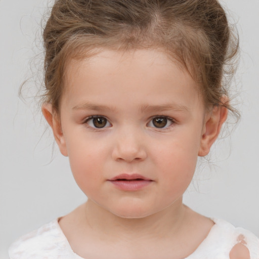 Neutral white child female with medium  brown hair and brown eyes