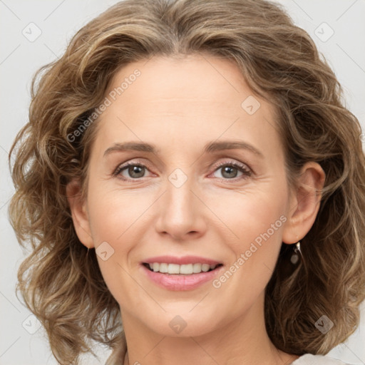 Joyful white young-adult female with medium  brown hair and green eyes