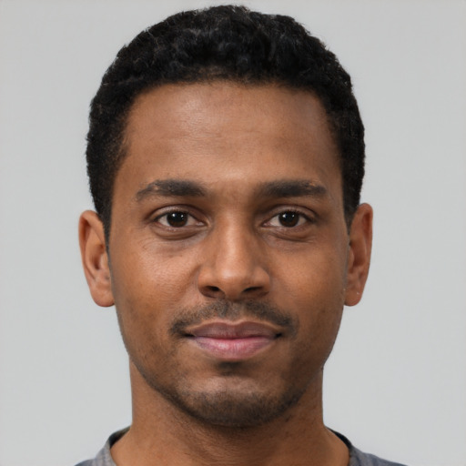 Neutral black young-adult male with short  black hair and brown eyes