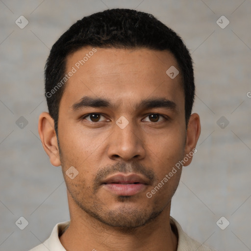 Neutral latino young-adult male with short  black hair and brown eyes