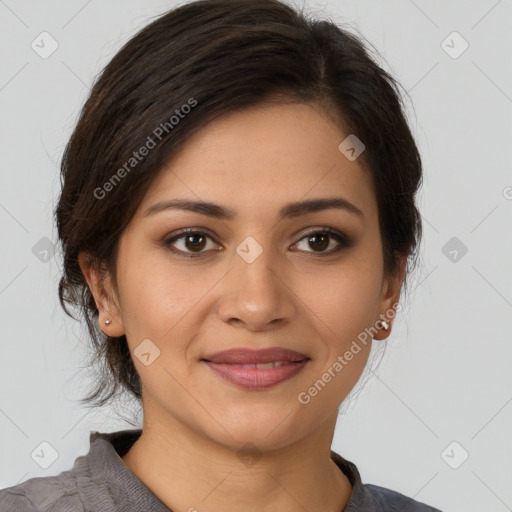 Joyful latino young-adult female with short  brown hair and brown eyes