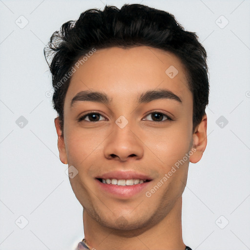 Joyful white young-adult male with short  black hair and brown eyes