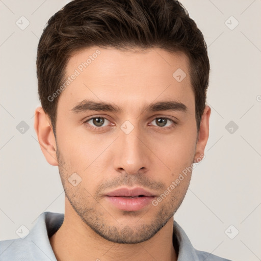 Neutral white young-adult male with short  brown hair and brown eyes