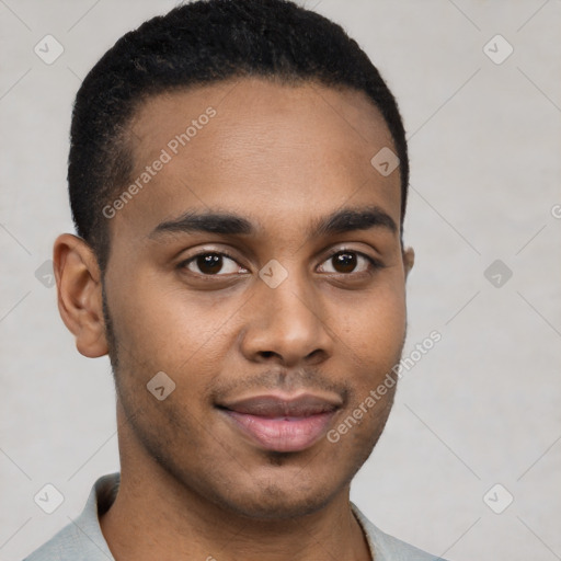 Joyful black young-adult male with short  brown hair and brown eyes