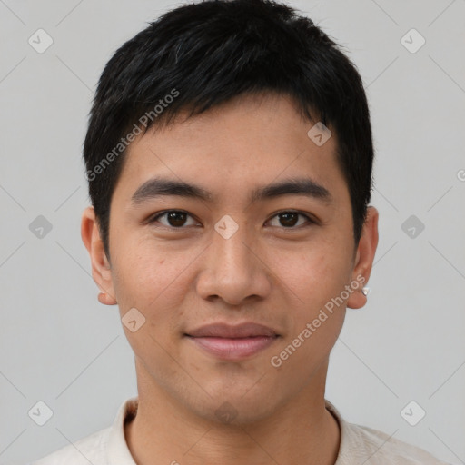 Joyful asian young-adult male with short  brown hair and brown eyes