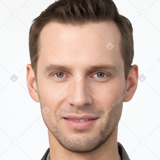 Joyful white young-adult male with short  brown hair and brown eyes