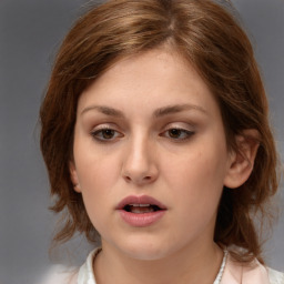 Neutral white young-adult female with medium  brown hair and brown eyes