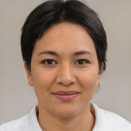 Joyful white young-adult female with medium  brown hair and brown eyes