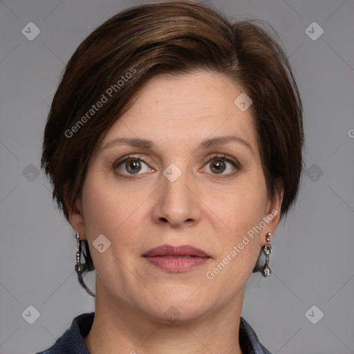 Joyful white adult female with medium  brown hair and grey eyes