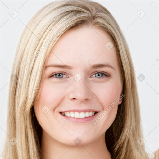 Joyful white young-adult female with long  brown hair and blue eyes