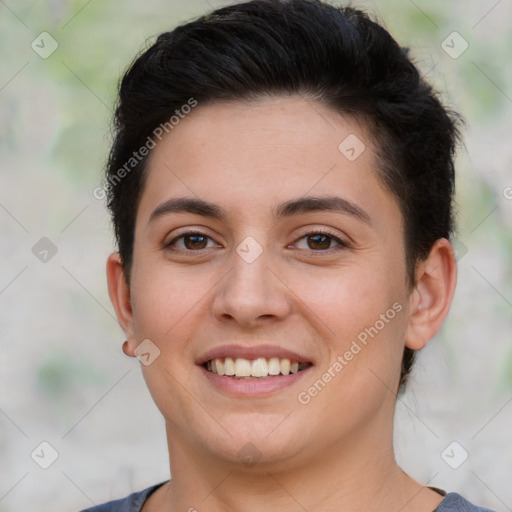 Joyful white young-adult female with short  brown hair and brown eyes