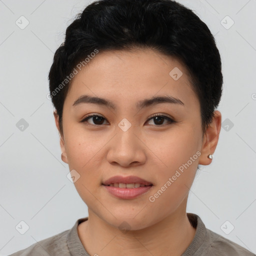 Joyful asian young-adult female with short  brown hair and brown eyes