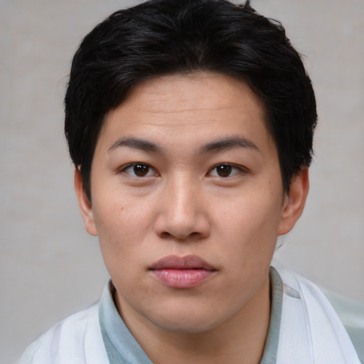 Neutral asian young-adult female with short  brown hair and brown eyes